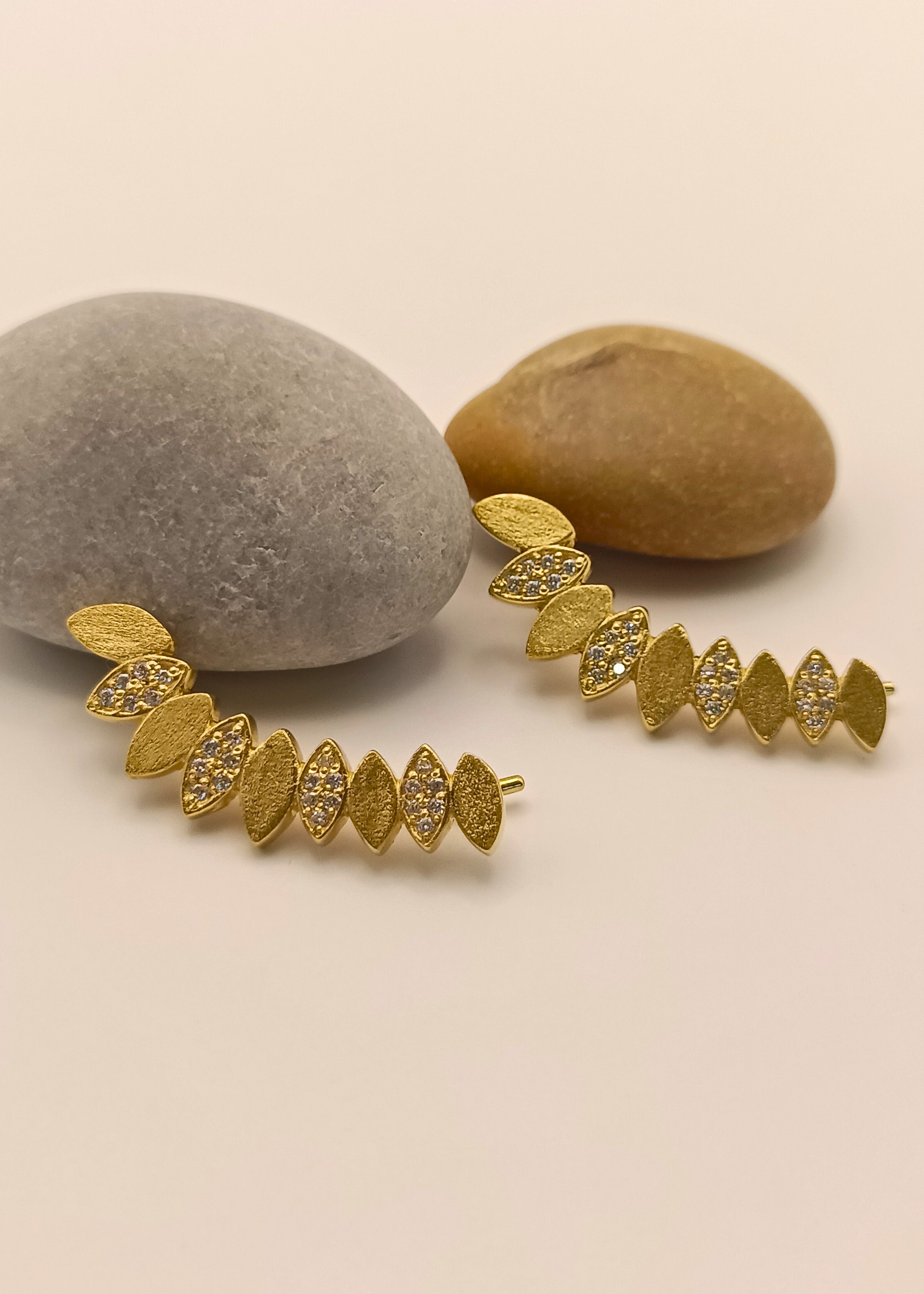 Brincos Musqée Olea